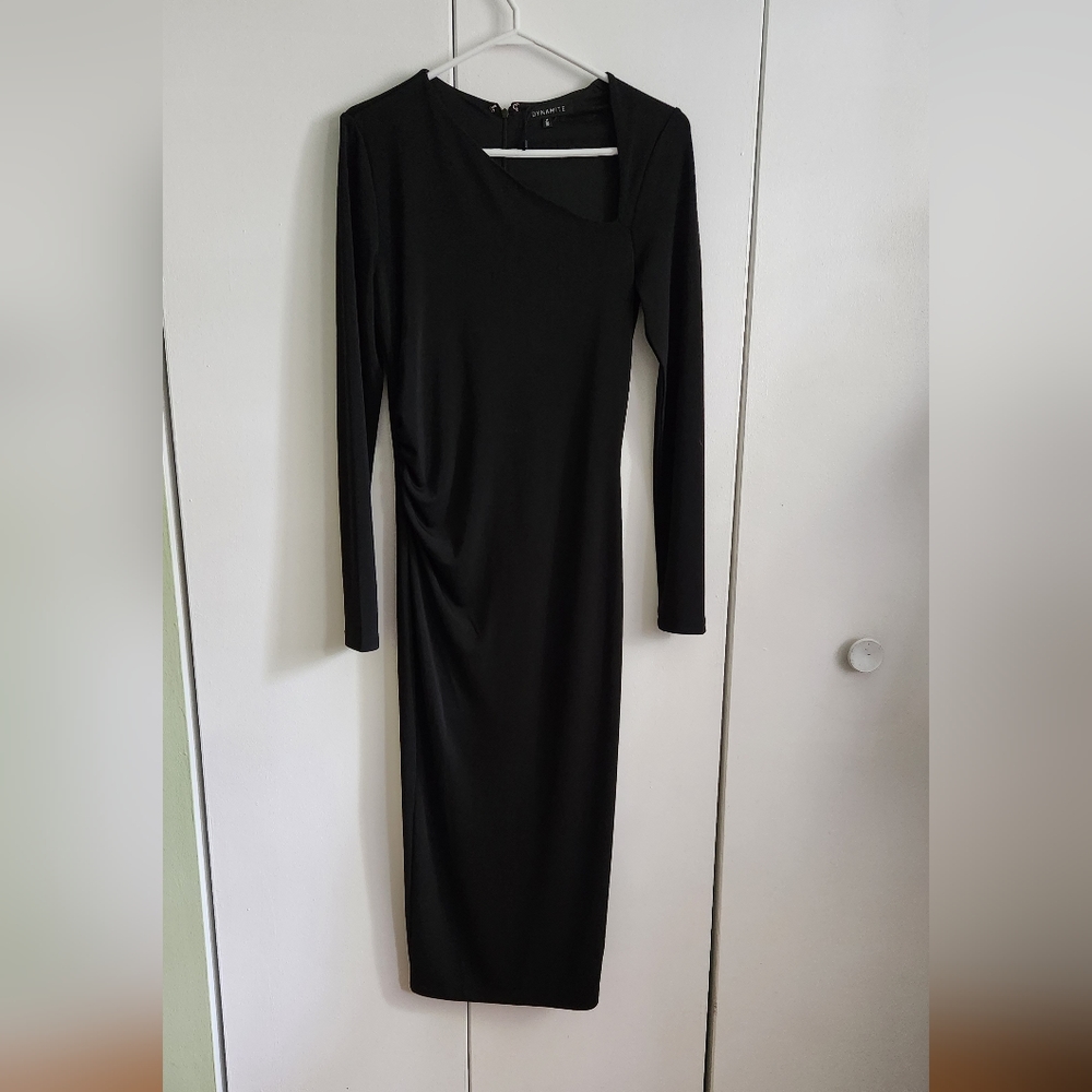 Dynamite NWOT black maxi dress with ruffled side and side v-neck accent.